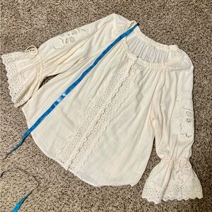Lovestitch , embroidered blouse with lace detail.